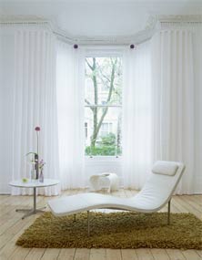 bay window with white curtains